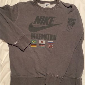 Distressed Nike International Sweater